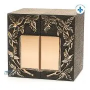 Bronze double urn with vine motif