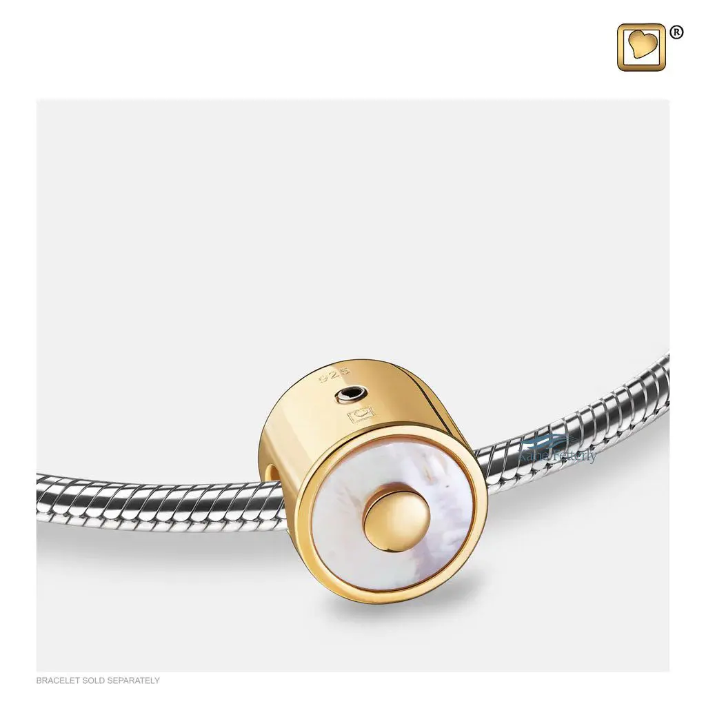 Breloque pour cendres plaquée en or dotée d'insert en nacre.