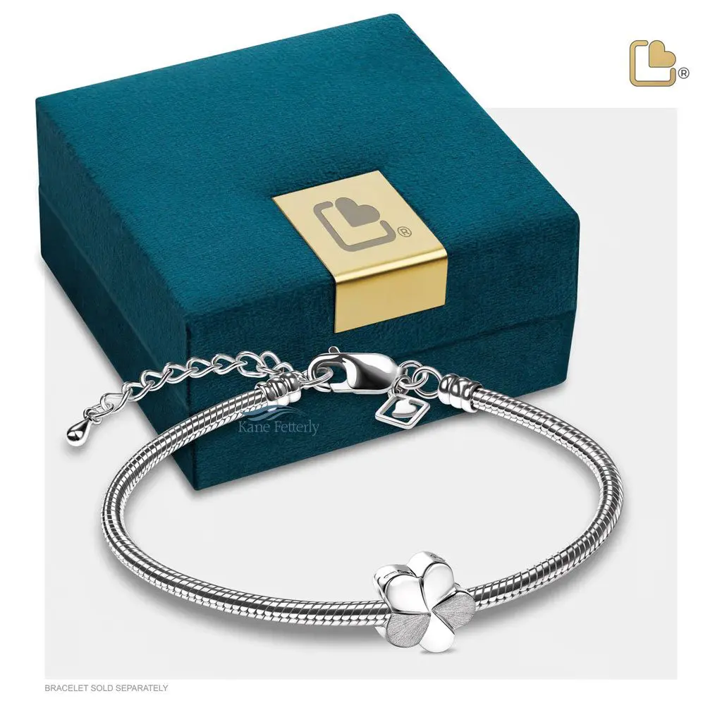 Flower charm in sterling silver (shown with jewelry box)