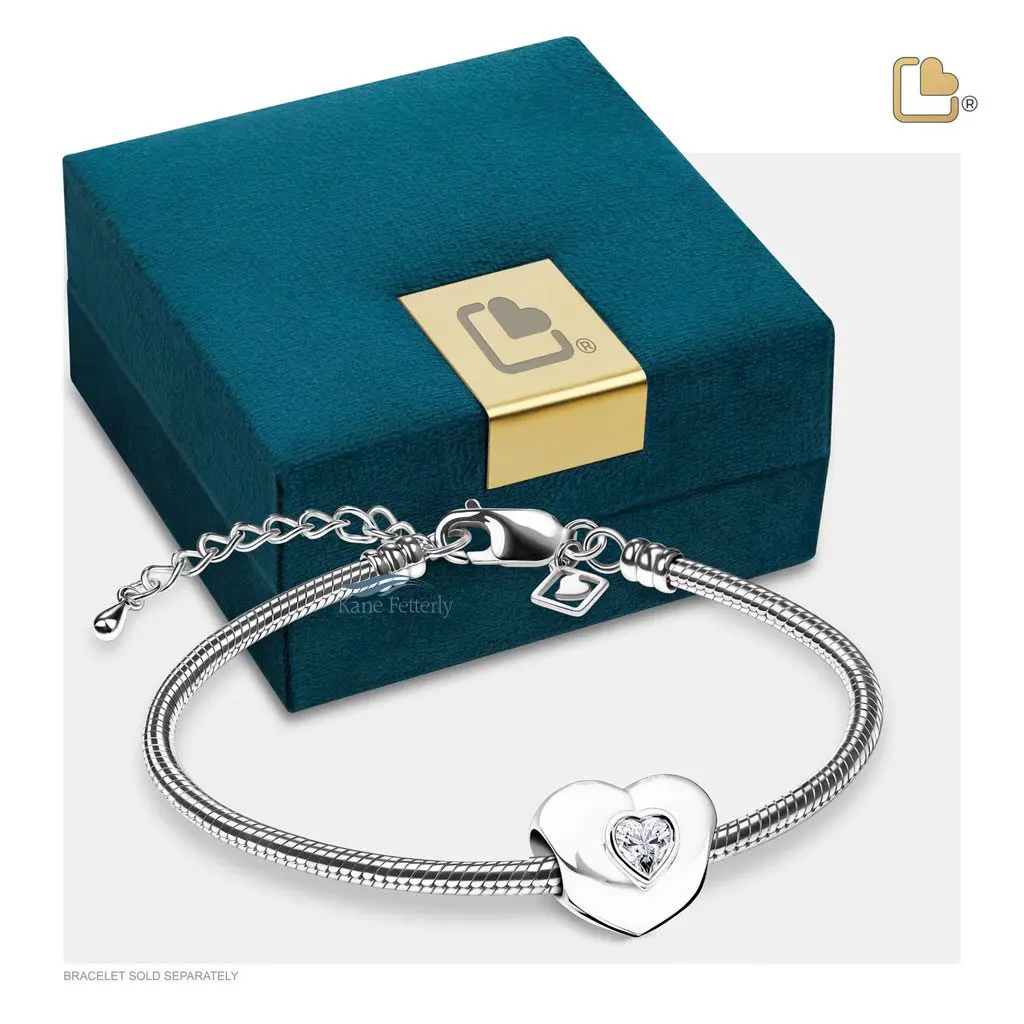 Breloque pour cendres en forme de coeur (illustrée avec coffret â bijoux)