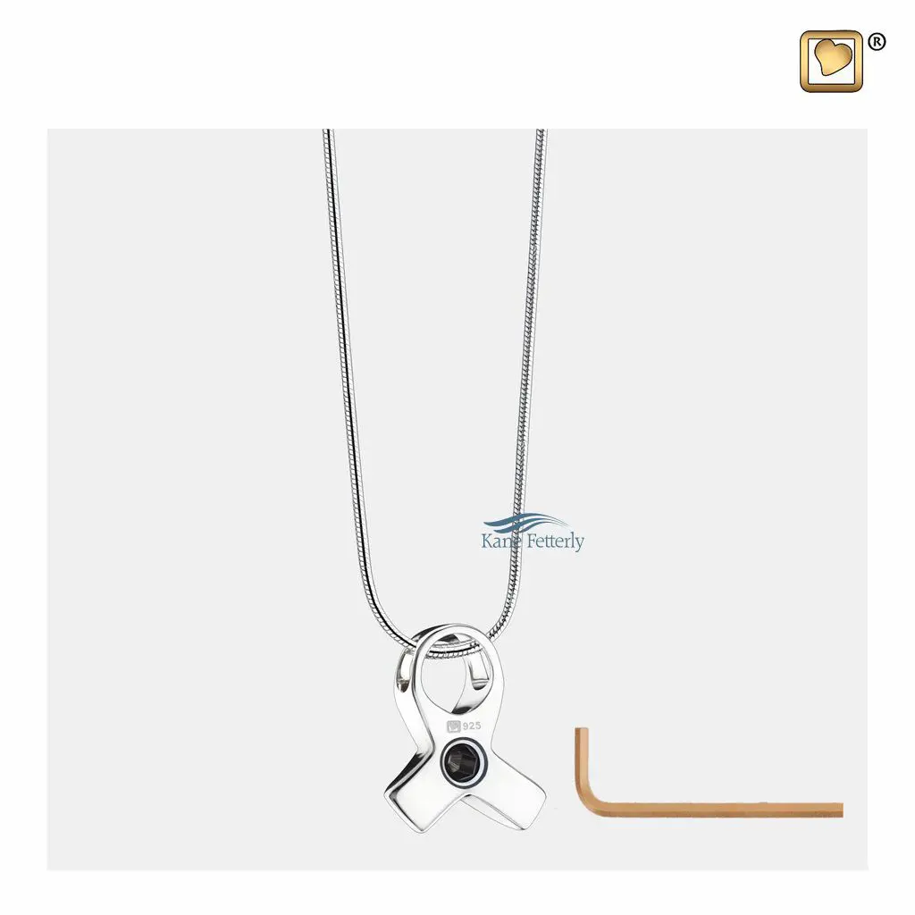 The pendant features a small compartment to hold a token of ashes