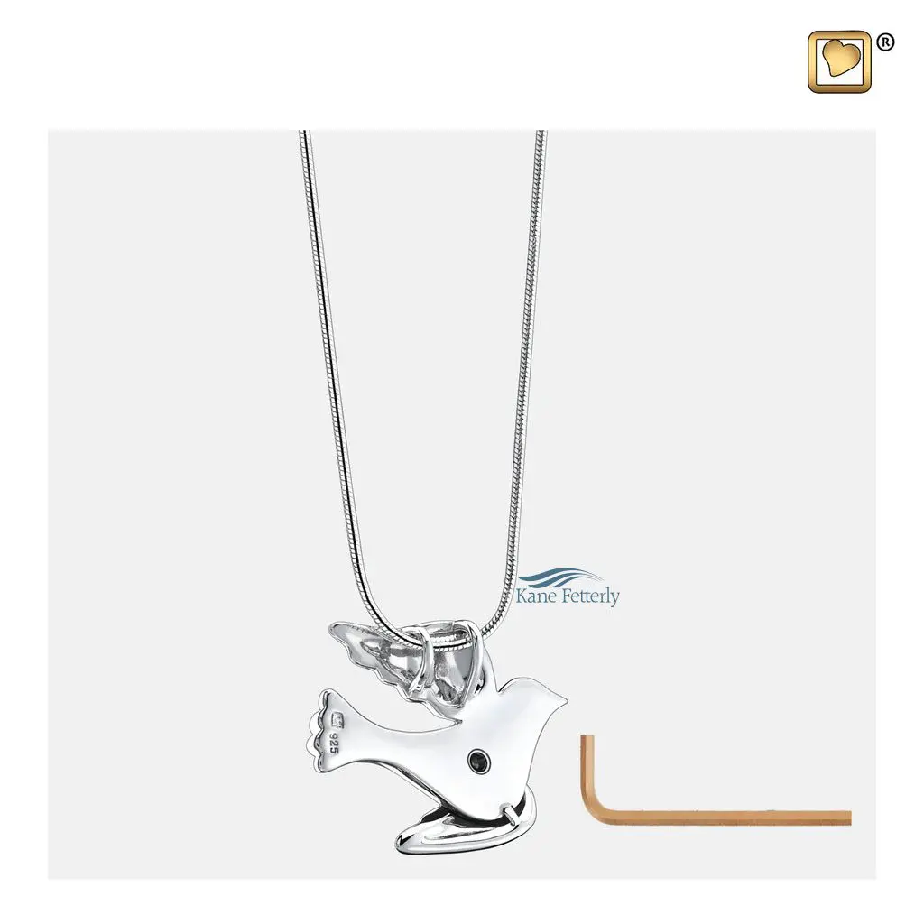 Features a small compartment designed to hold a token of cremated remains.