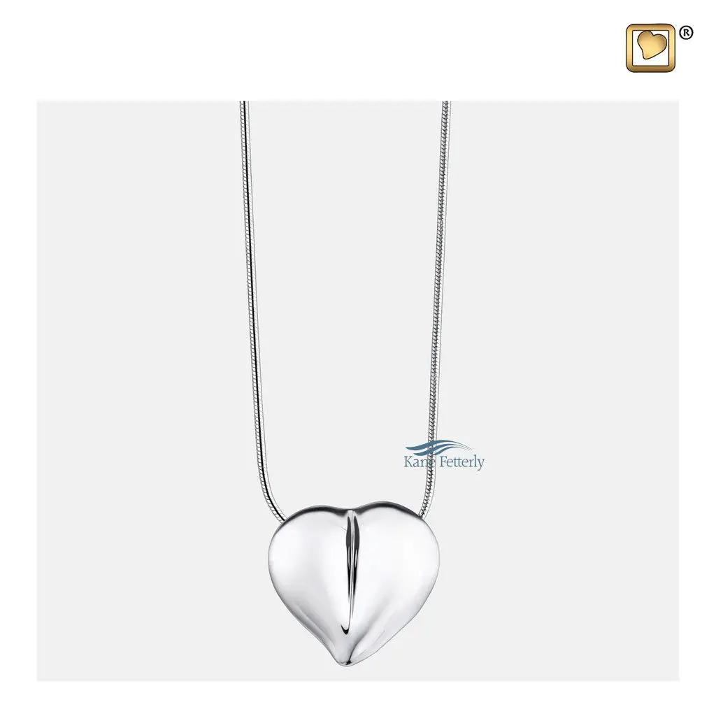 A sterling silver chain is included in the price.