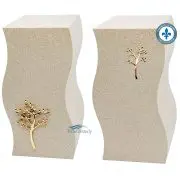 Urne double avec une finition beige et des ornements d'arbre dorés.