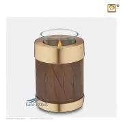 Urne miniature en forme de bougeoir avec une finition brune nacrée