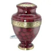 Urne en métal rouge ornée de bandes dorées