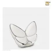 Urne miniature en forme de papillon en laiton et alliage avec une finition blanche nacrée