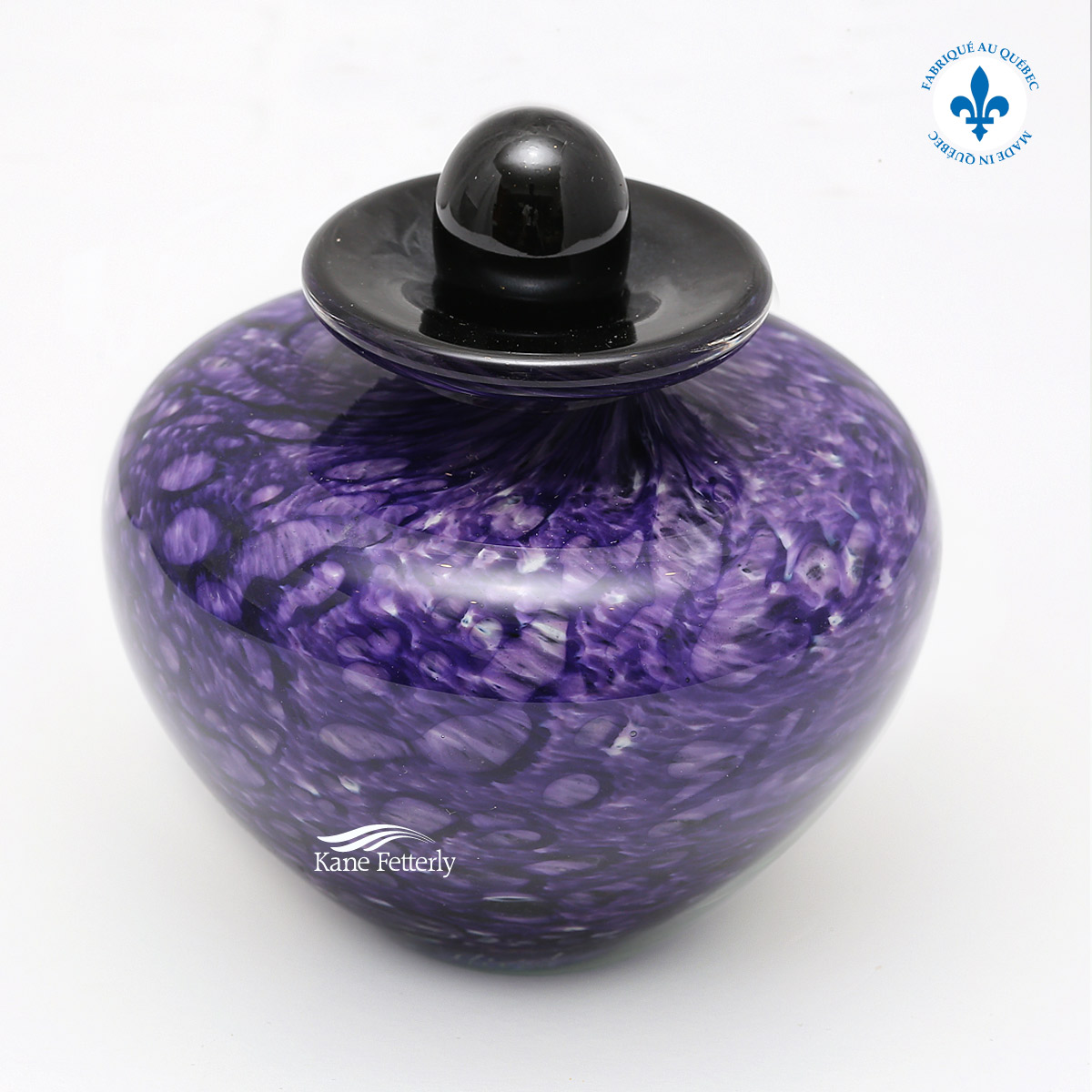 Violet glass miniature urn