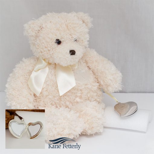 Teddy bear with heart locket