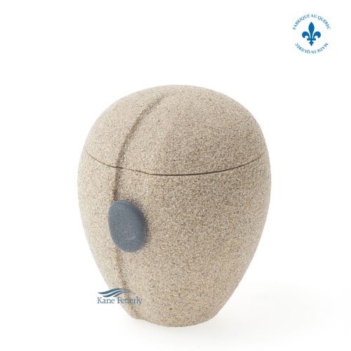 Sand miniature urn with shore pebble