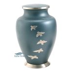 Blue brass urn with doves