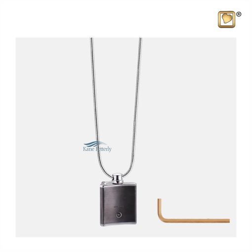 Features a small compartment designed to hold a token of cremated remains.