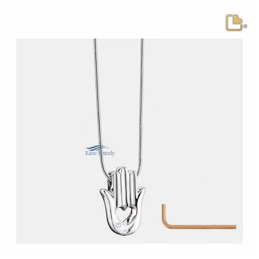 Doté d’un petit compartiment pour conserver une quantité symbolique des cendres.