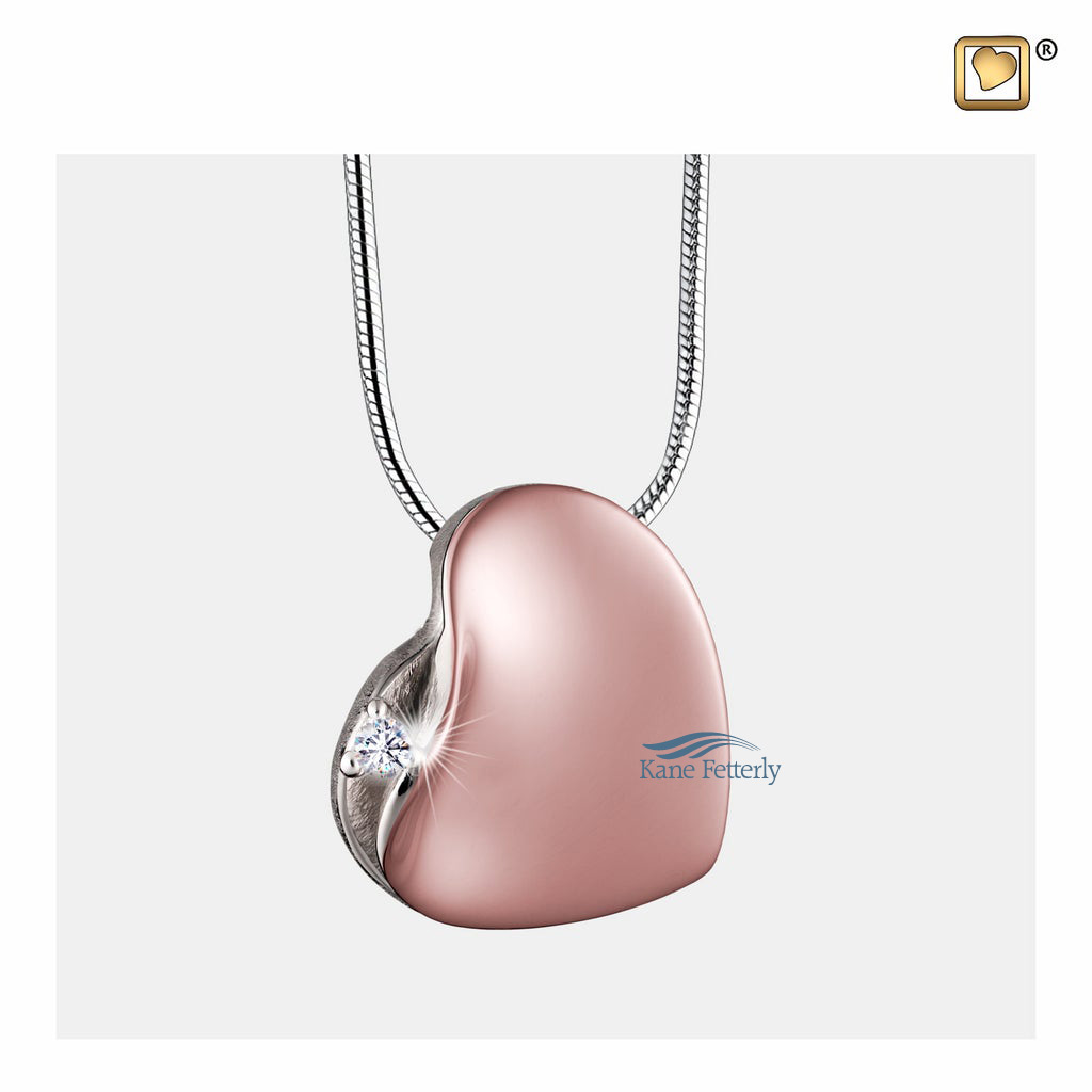 Heart pendant in  sterling silver gilded in rose gold with crystal.