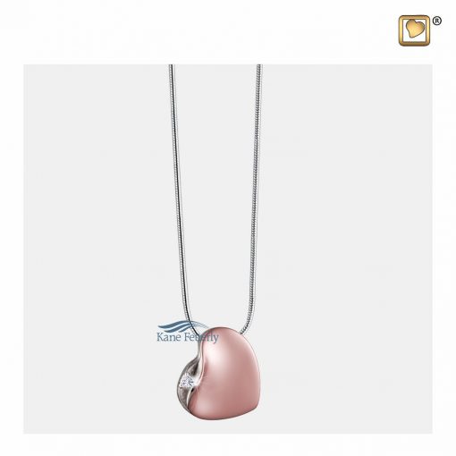 Heart pendant in sterling silver gilded in rose gold with crystal.
