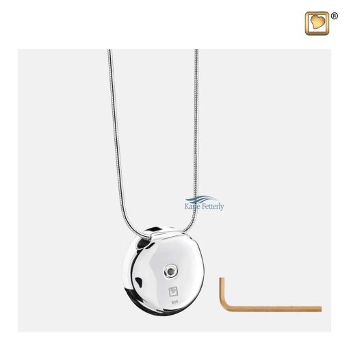 The pendant features a small compartment to hold a token of ashes