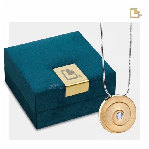 Pendentif pour cendres rond avec zirconia illustré avec coffret à bijoux