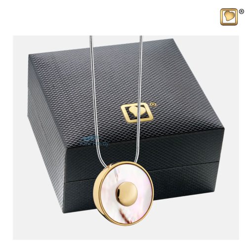 Pendentif pour cendres rond avec insert en nacre illustré avec coffret à bijoux