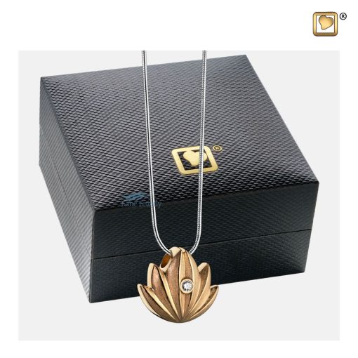 Lotus pendant for ashes with zirconia shown with box