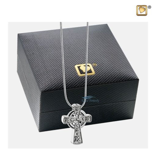 Celtic cross pendant for ashes shown with jewelry box