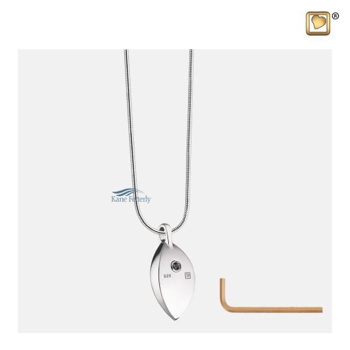 The pendant features a discreet back compartment for holding ashes.