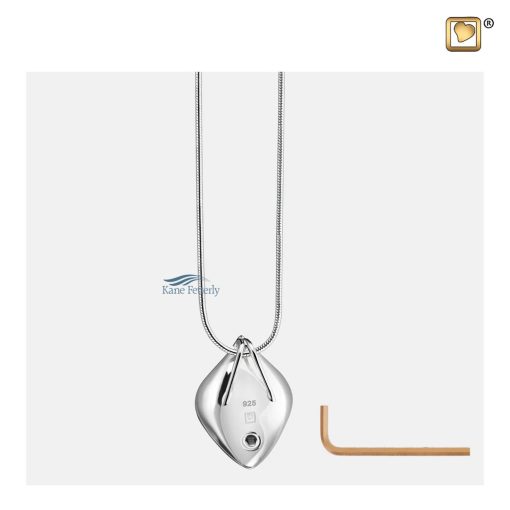 The pendant features a discreet back compartment for holding ashes.
