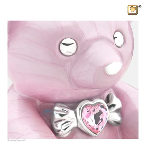 Teddy-bear-shaped medium-sized urn with a crystal, pink finish, and silver polished accents.