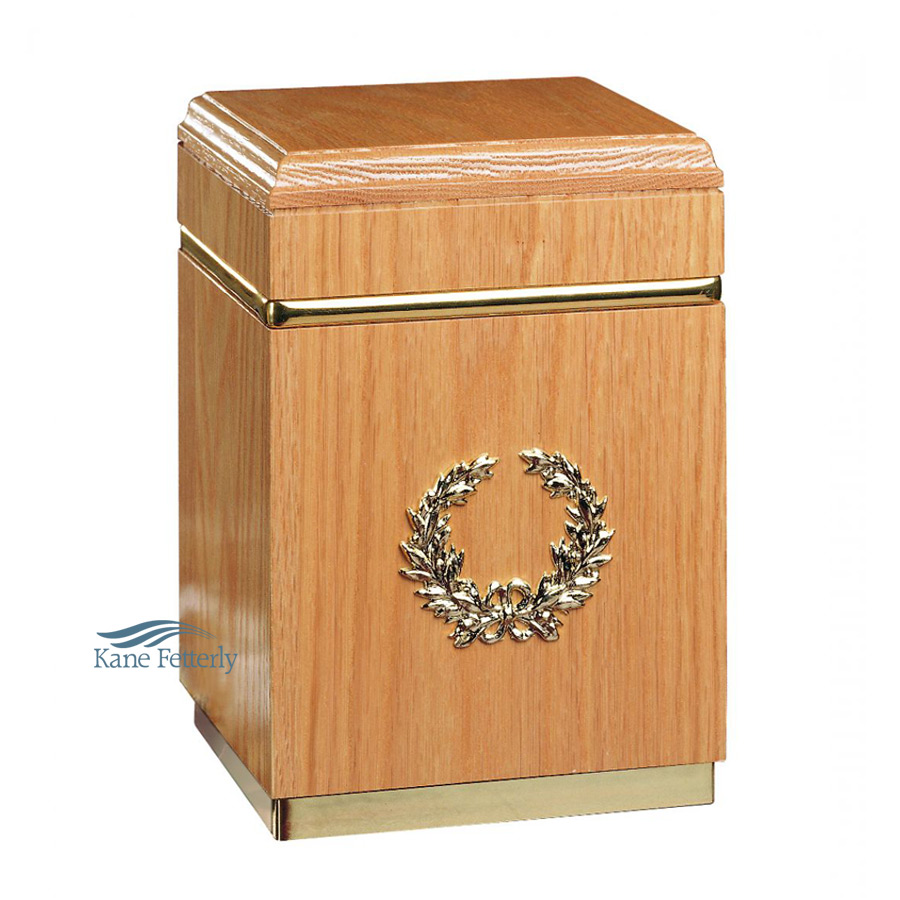 Solid oak urn with gold wreath