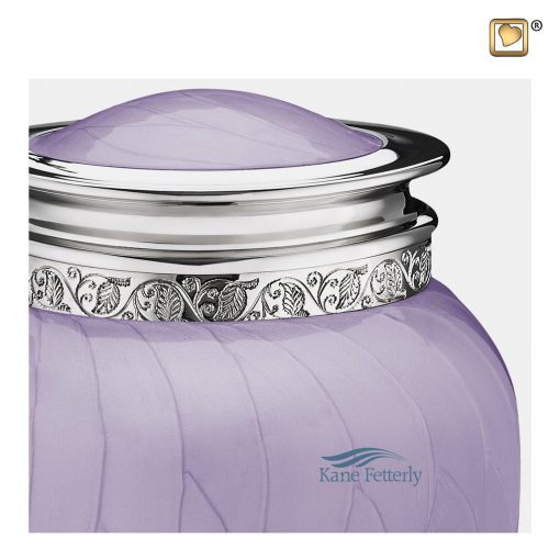 Lavander brass urn with pearlescent finish.