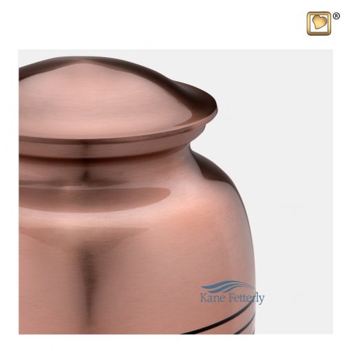 Metal urn with copper glossy finish