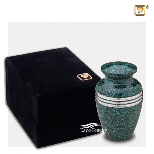Green miniature urn shown with velvet box