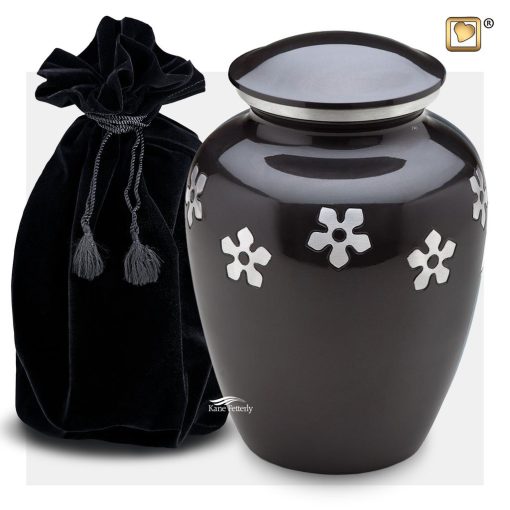 Urn with flowers shown with velvet bag