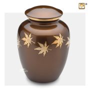 Brown metal urn with gold leaves