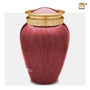 Crimson red brass urn with pearlescent finish.