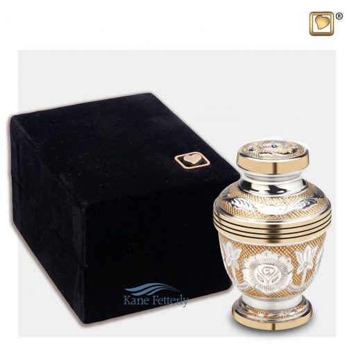 Miniature urn shown with box