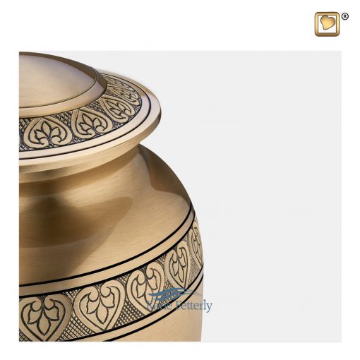 Gold brass urn with hearts