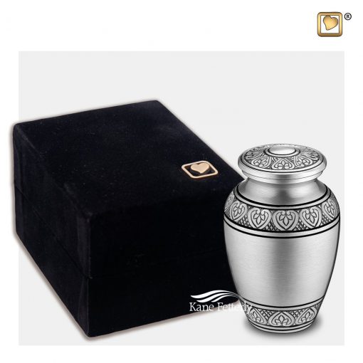 Silver miniature urn shown with velvet box