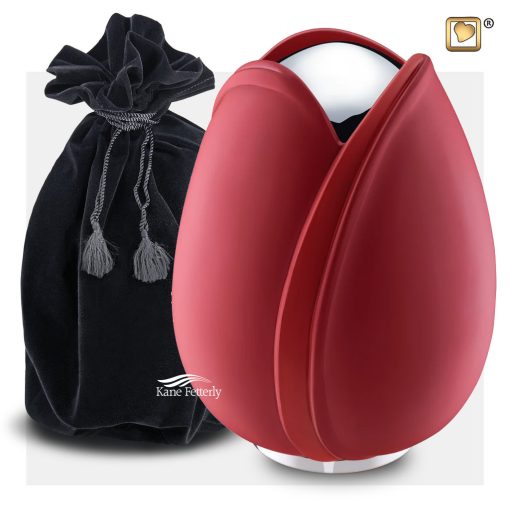 Tulip-shaped urn with a red finish shown with velvet bag