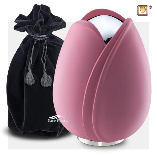 Tulip-shaped urn with a pink finish shown with velvet bag