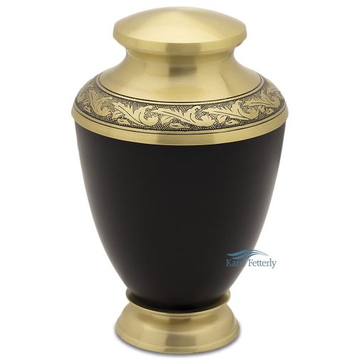 Metal alloy urn with a black finish and brushed gold accents